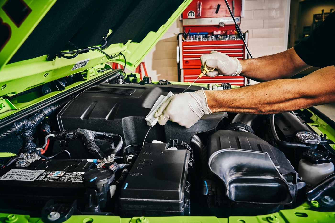 Man servicing jeep wrangler