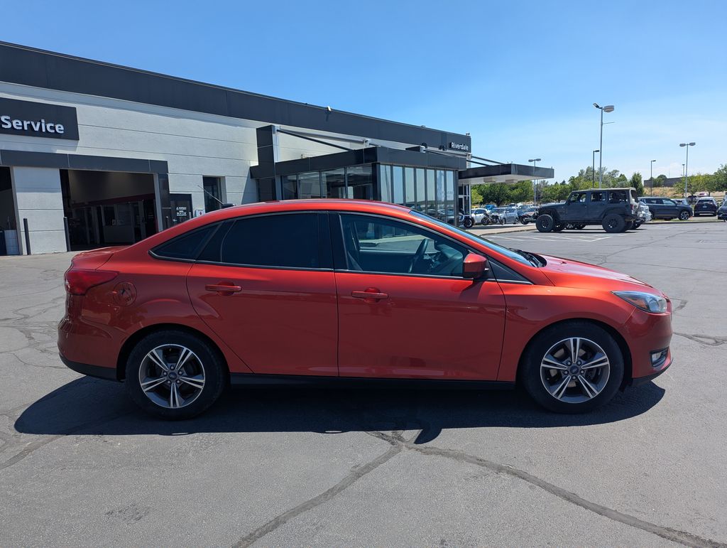 Used 2018 Ford Focus SE with VIN 1FADP3F21JL270030 for sale in Riverdale, UT