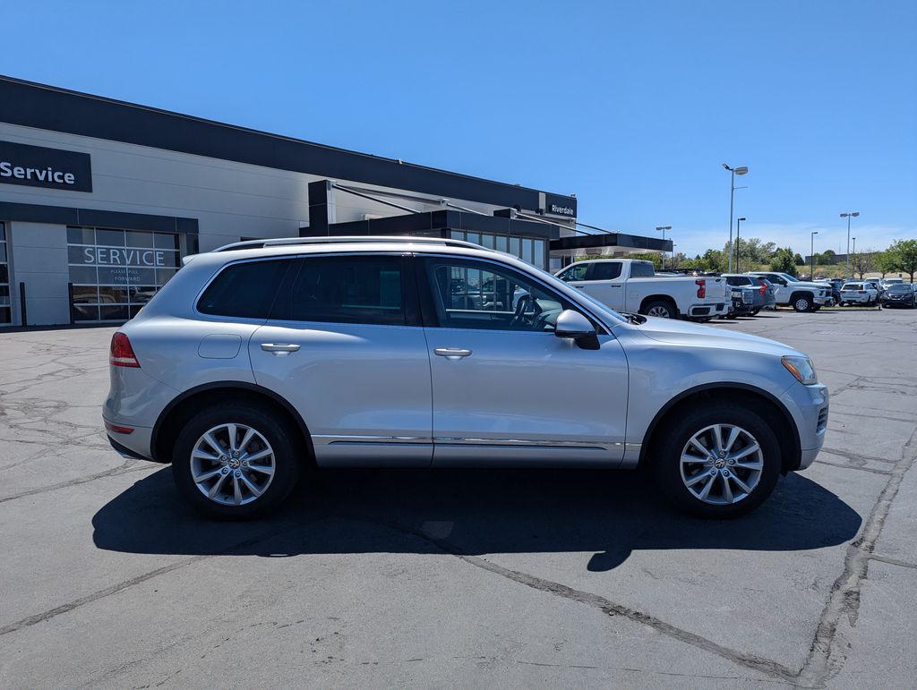 Used 2014 Volkswagen Touareg Sport with VIN WVGEF9BP3ED006387 for sale in Riverdale, UT