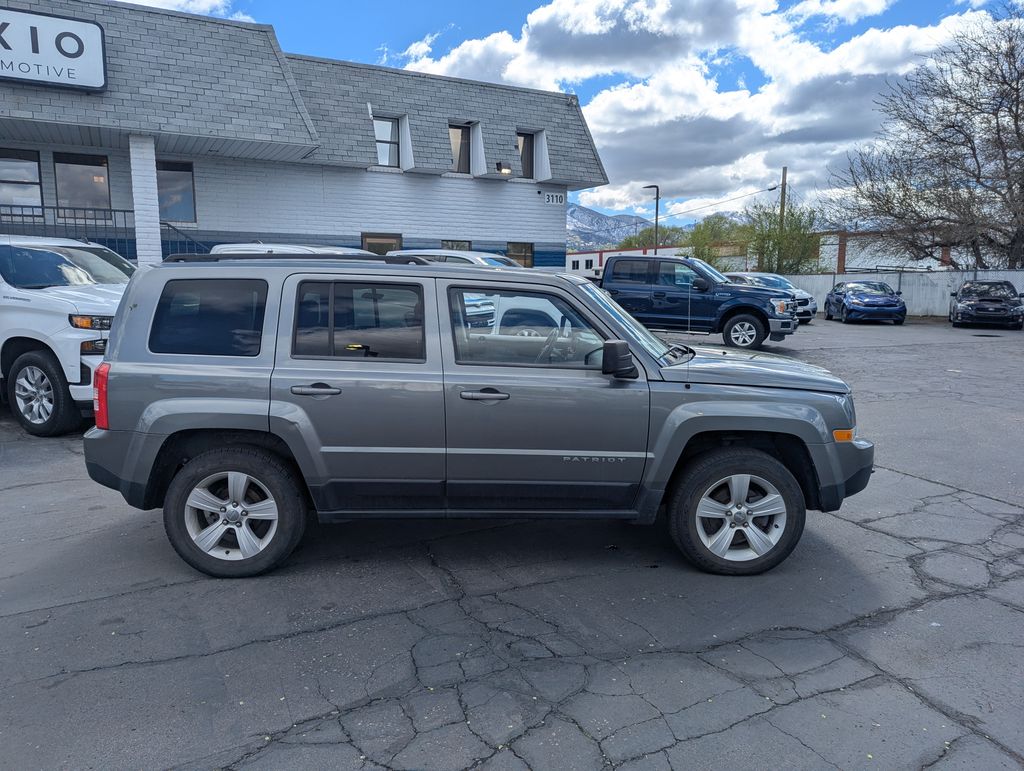 Used 2014 Jeep Patriot Latitude with VIN 1C4NJRFB8ED501220 for sale in Riverdale, UT