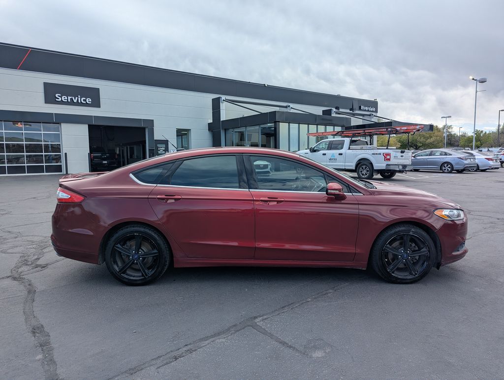 Used 2016 Ford Fusion SE with VIN 3FA6P0H74GR329288 for sale in Riverdale, UT