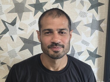 Staff member Samad Jawed from ID_a48b72c3f513