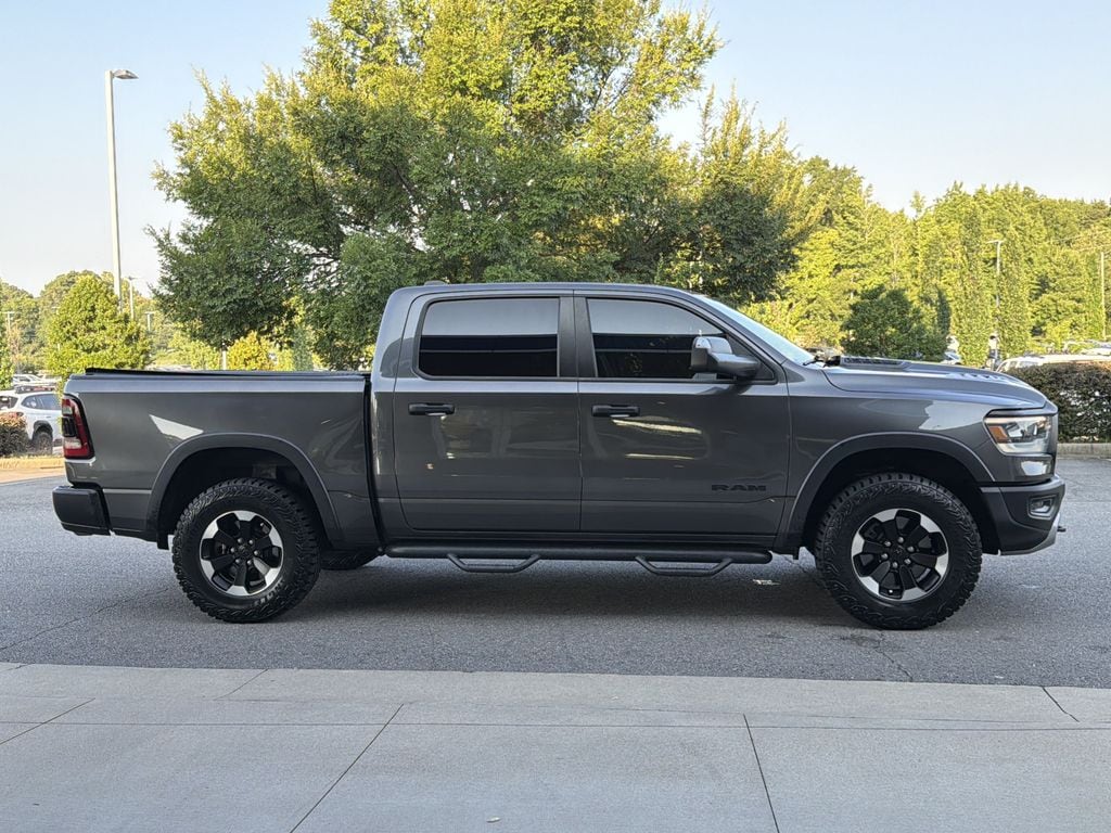 Used 2021 RAM Ram 1500 Pickup Rebel with VIN 1C6SRFLT3MN831113 for sale in Little Rock