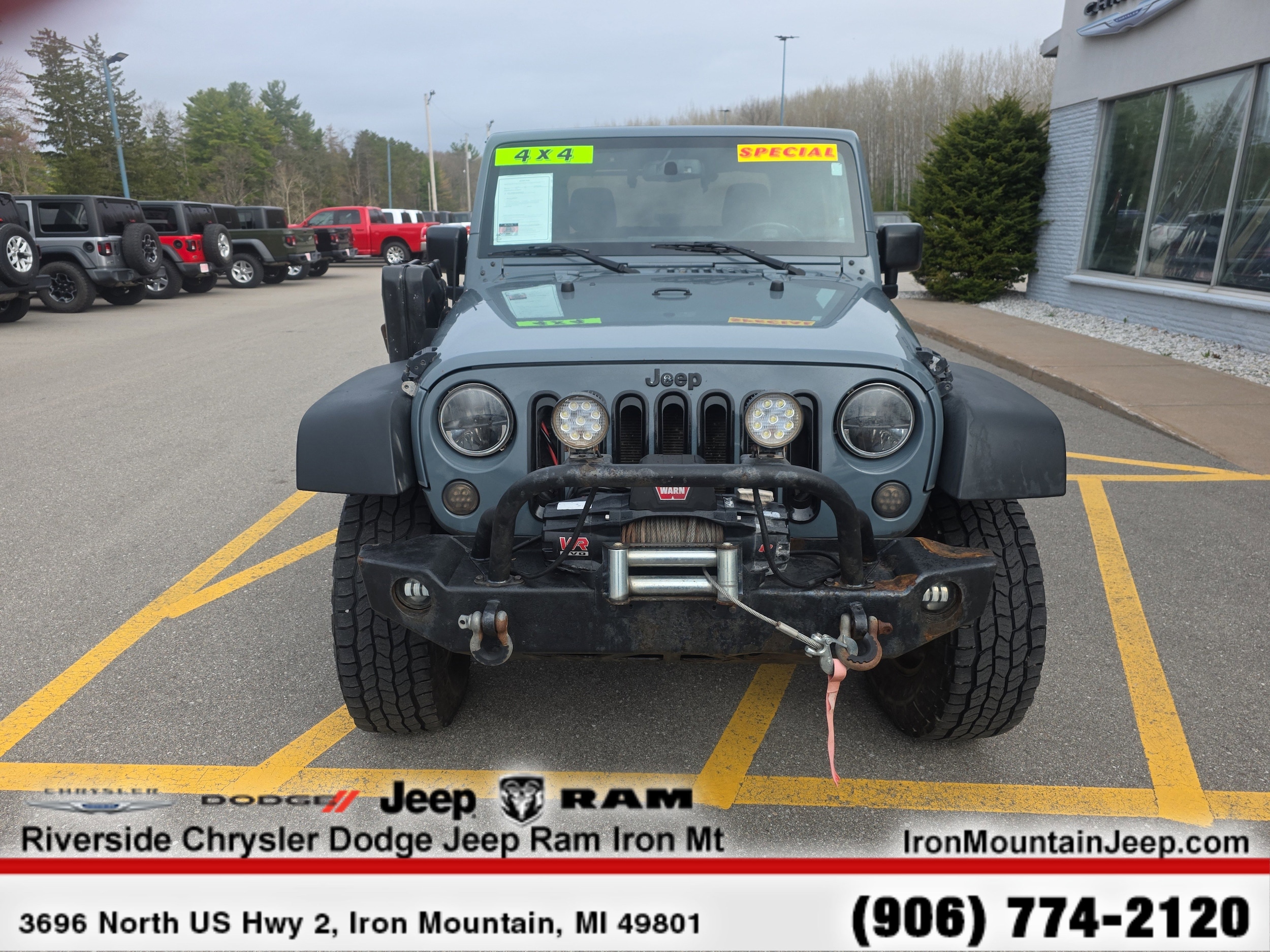 Used 2015 Jeep Wrangler Sport with VIN 1C4AJWAG1FL730734 for sale in Iron Mountain, MI