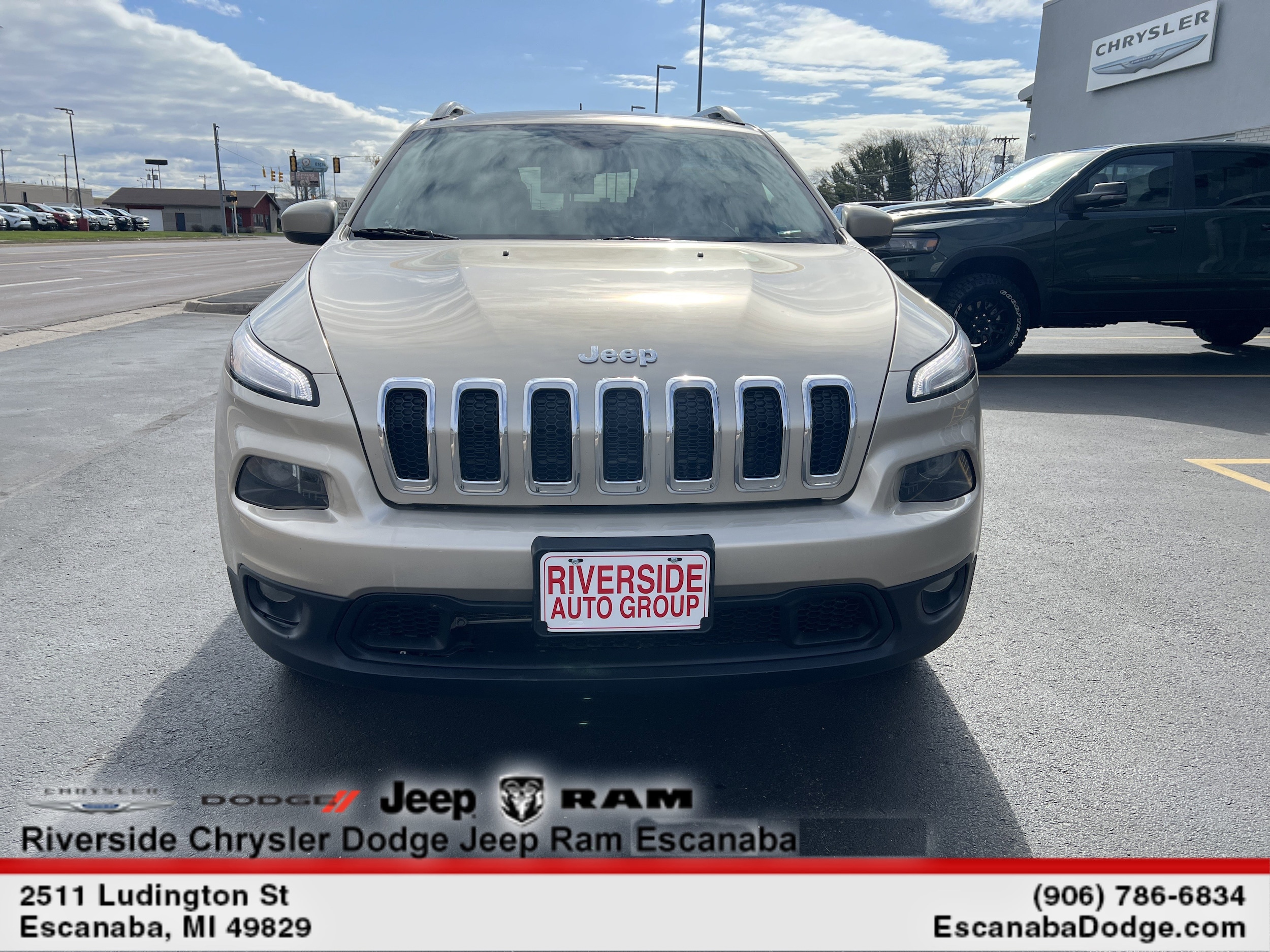 Used 2015 Jeep Cherokee Latitude with VIN 1C4PJMCS9FW565482 for sale in Escanaba, MI