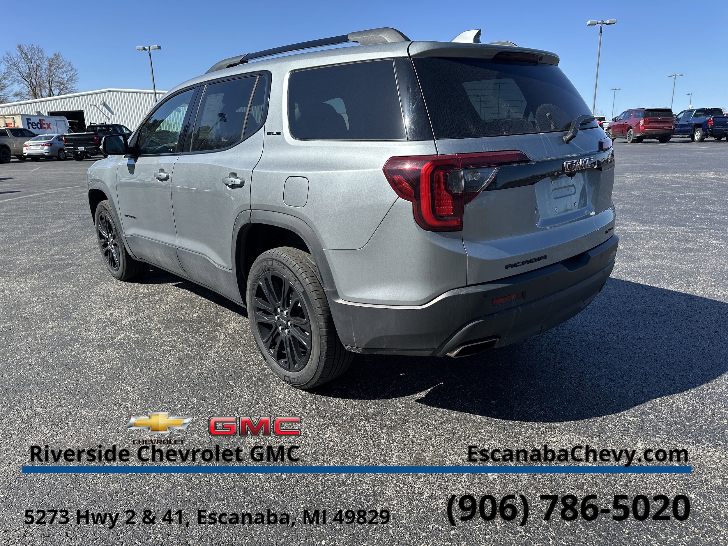 Used 2023 GMC Acadia SLE with VIN 1GKKNRL48PZ180982 for sale in Escanaba, MI