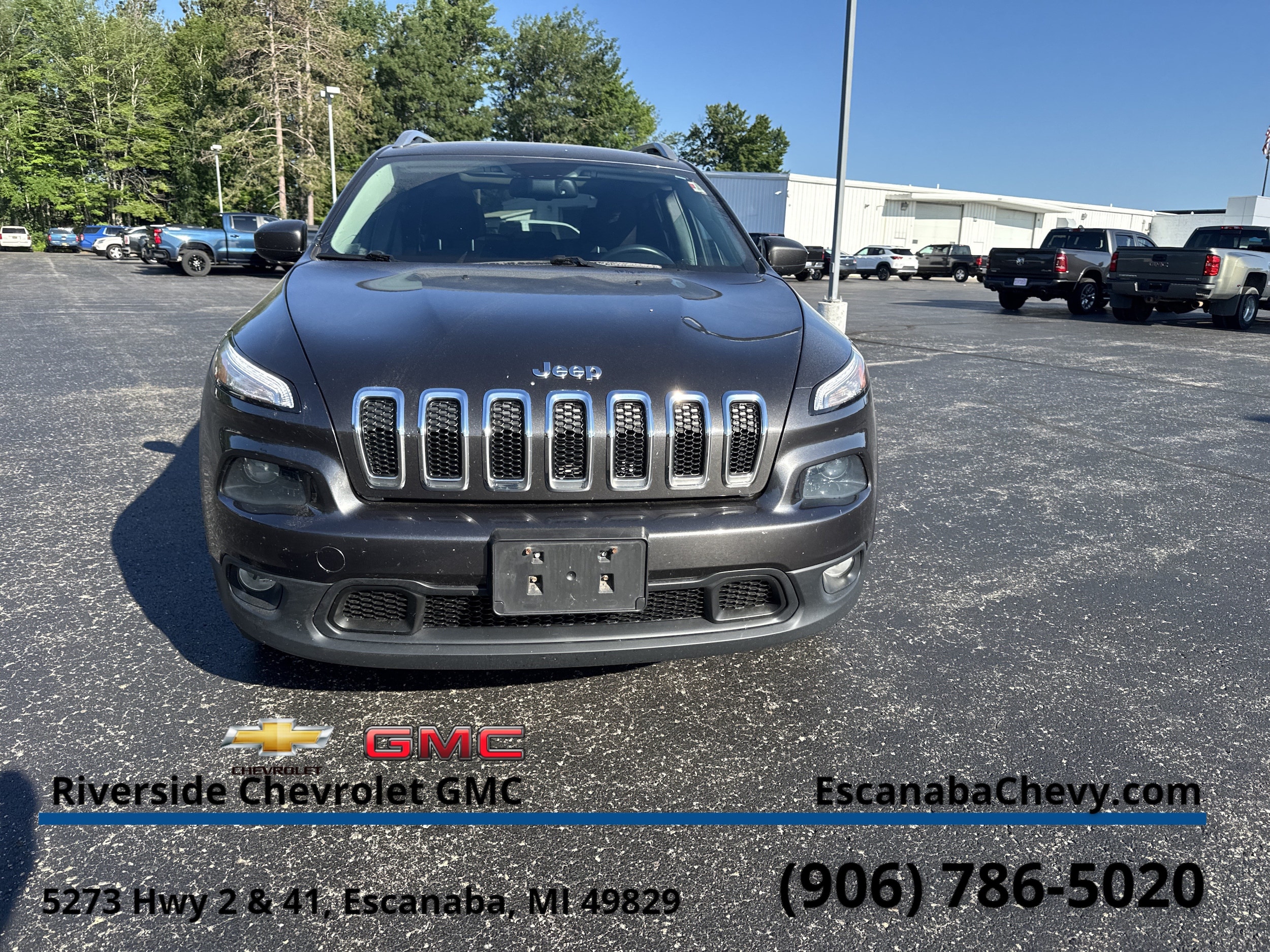Used 2014 Jeep Cherokee Latitude with VIN 1C4PJMCB7EW206758 for sale in Escanaba, MI