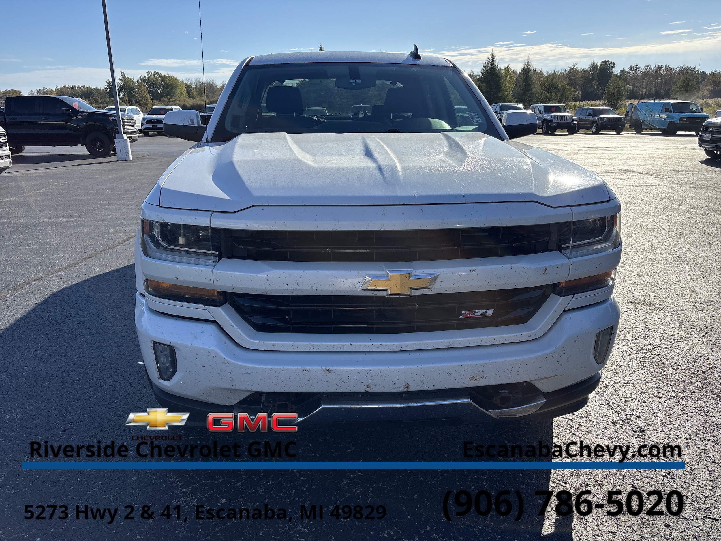 Used 2018 Chevrolet Silverado 1500 LT with VIN 3GCUKREC7JG595140 for sale in Escanaba, MI