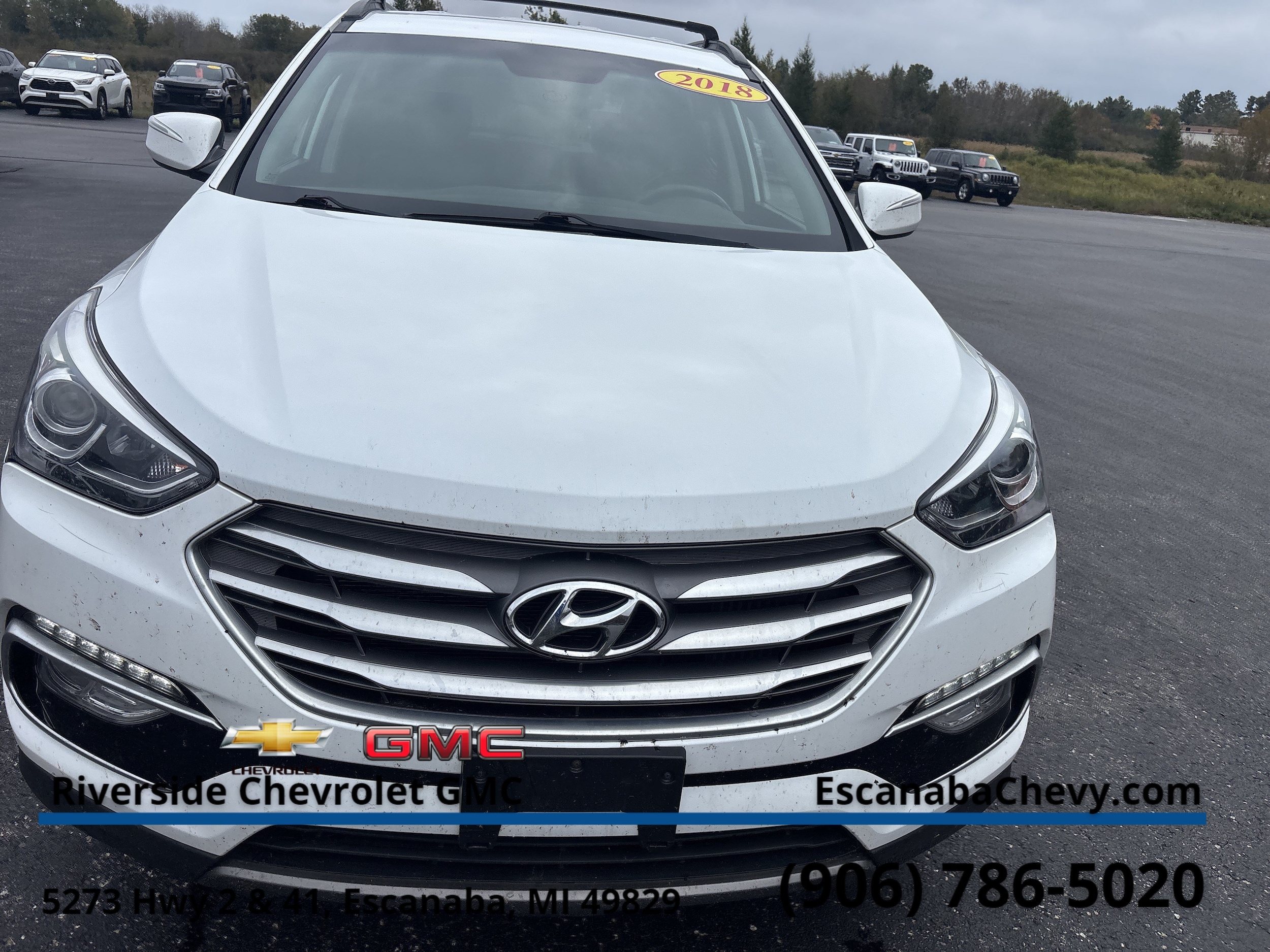 Used 2018 Hyundai Santa Fe Sport 2.0T with VIN 5XYZUDLA7JG552551 for sale in Escanaba, MI