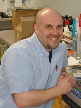 Staff member Brandon Koenig from ID_766856