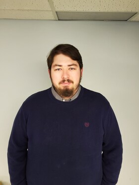 Staff member Joseph Living from a5a8f4b65a4c