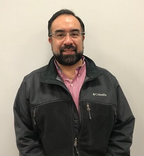 Staff member Cesar Guevara from a5a8f4b65a4c