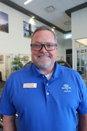 Staff member John Caddy from 1b3c234b0e2d