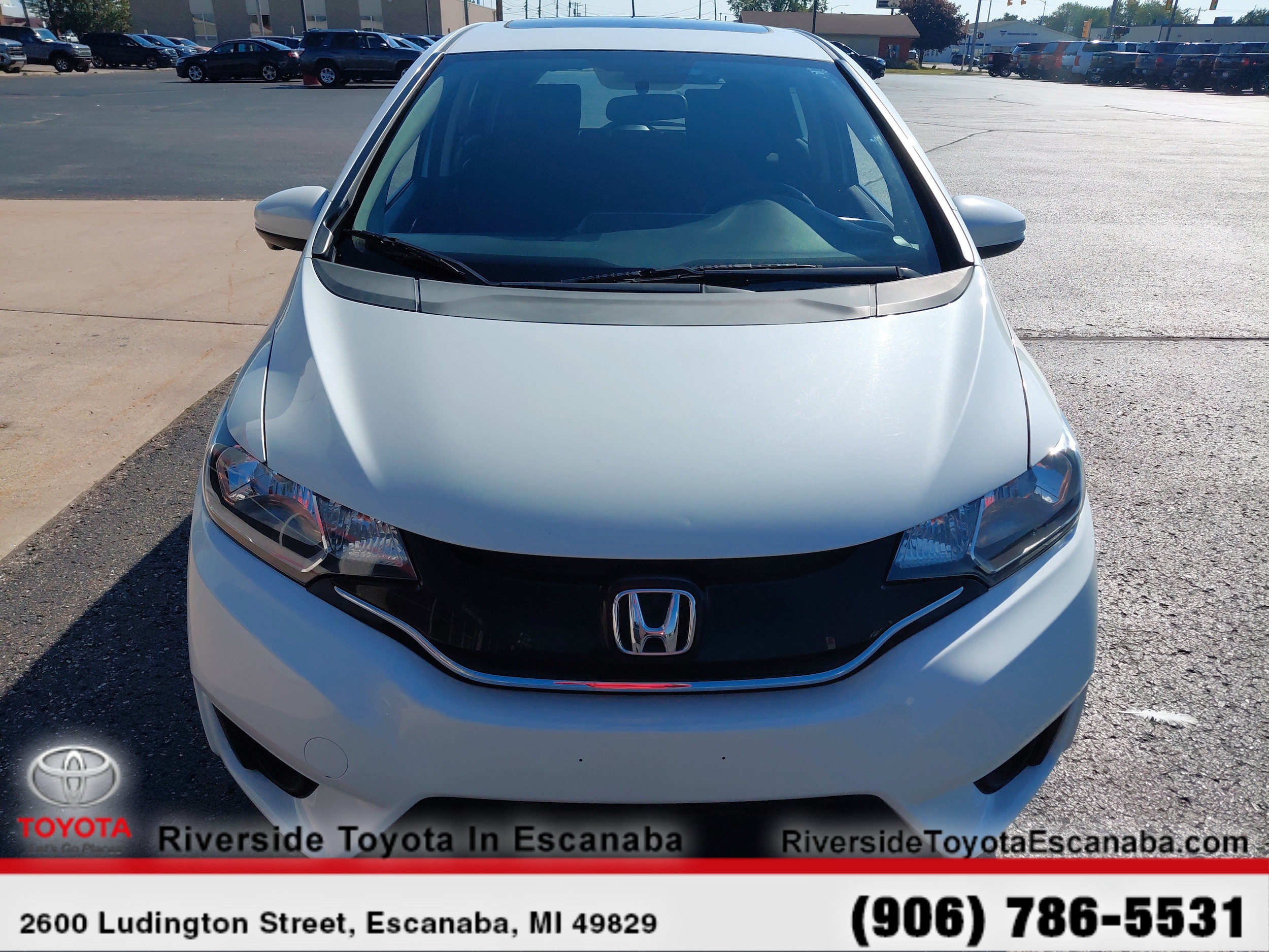 Used 2015 Honda Fit EX with VIN 3HGGK5H81FM733181 for sale in Escanaba, MI