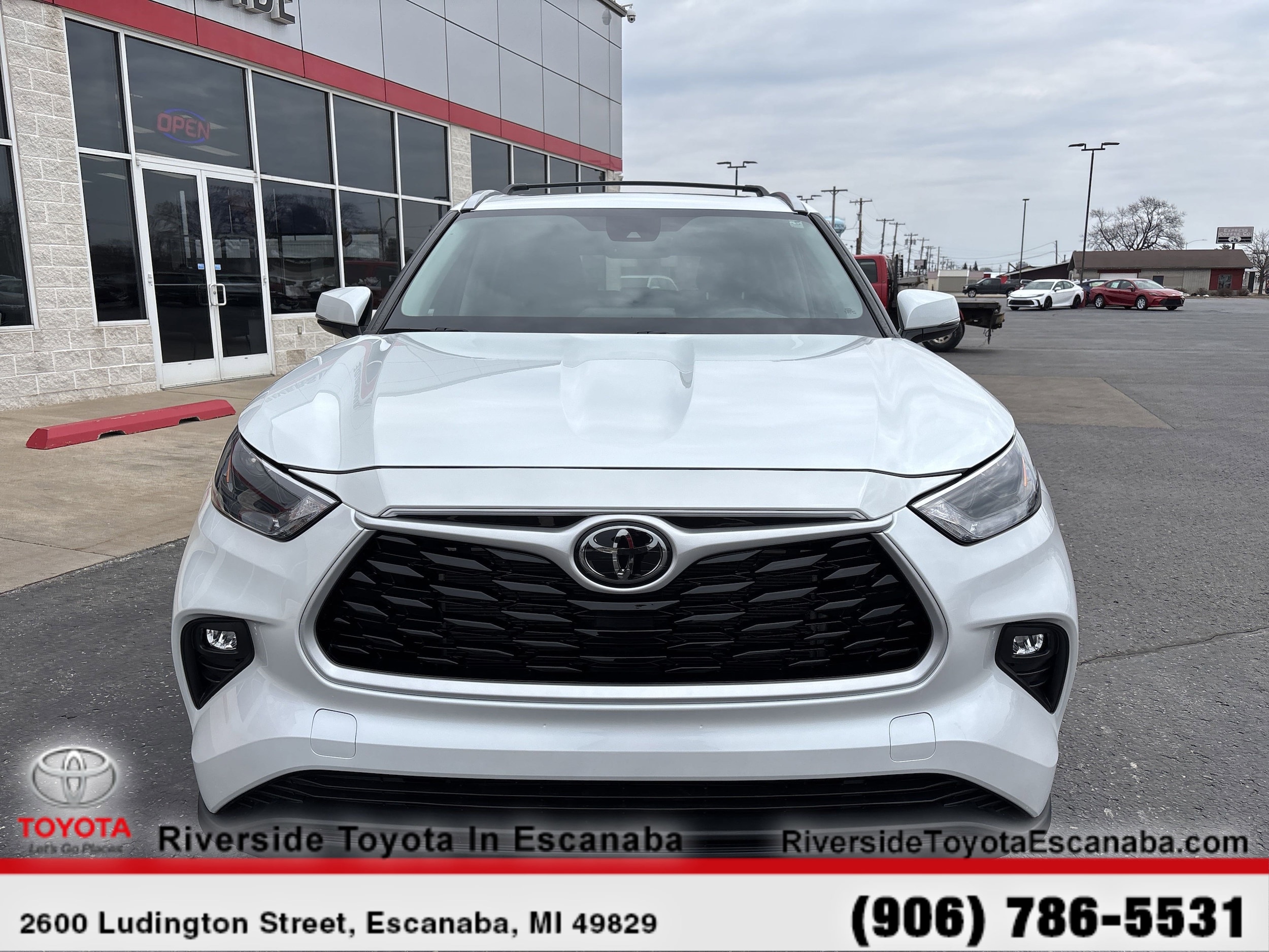 Used 2023 Toyota Highlander XLE with VIN 5TDKDRBH8PS502380 for sale in Escanaba, MI