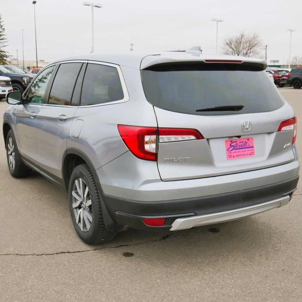 Used 2021 Honda Pilot EX-L with VIN 5FNYF6H54MB027732 for sale in Jamestown, ND