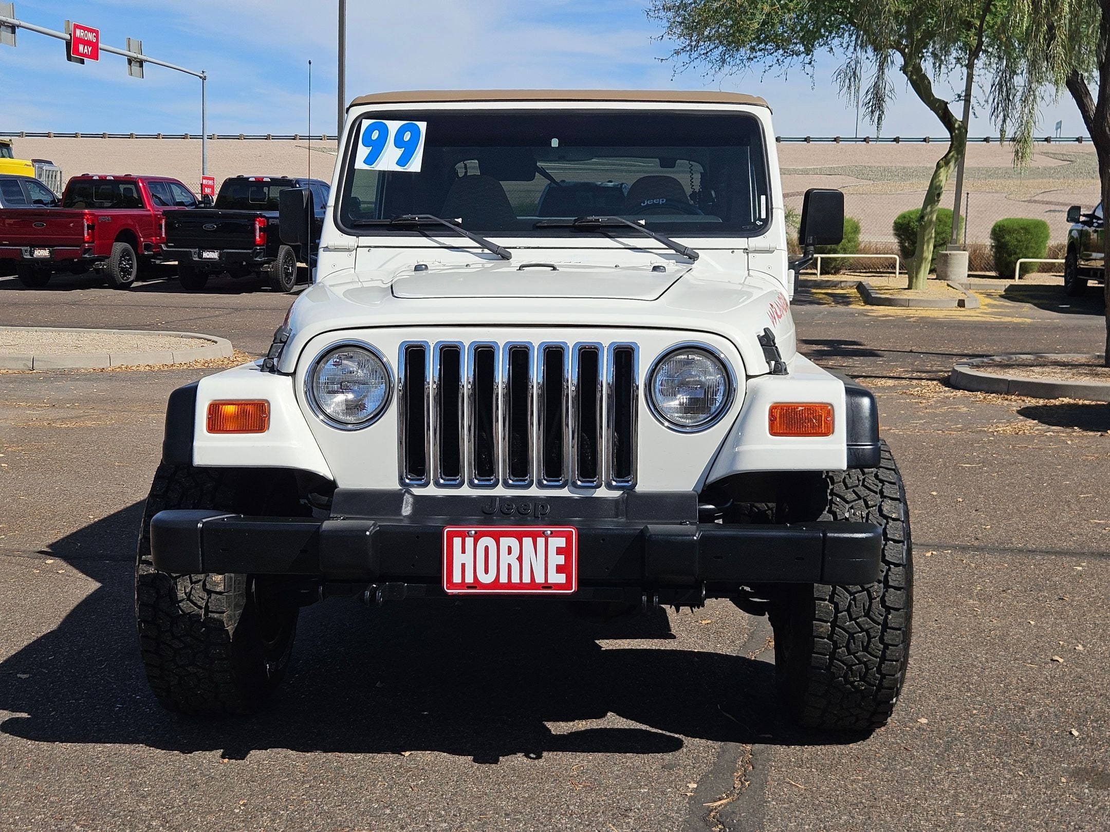 Used 1999 Jeep Wrangler SPORT with VIN 1J4FY19S7XP448115 for sale in Apache Junction, AZ