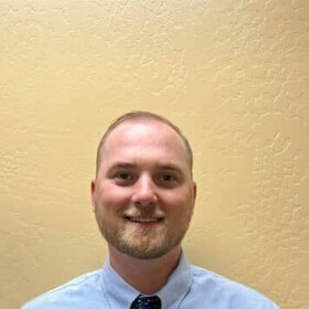 Staff member Logan Rauch from 93803945396d