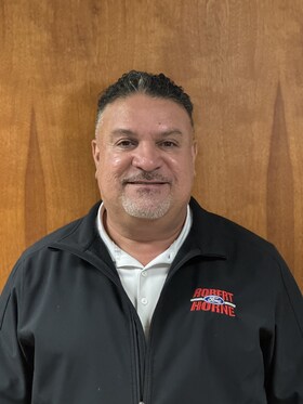 Staff member Noel Estrada from 93803945396d