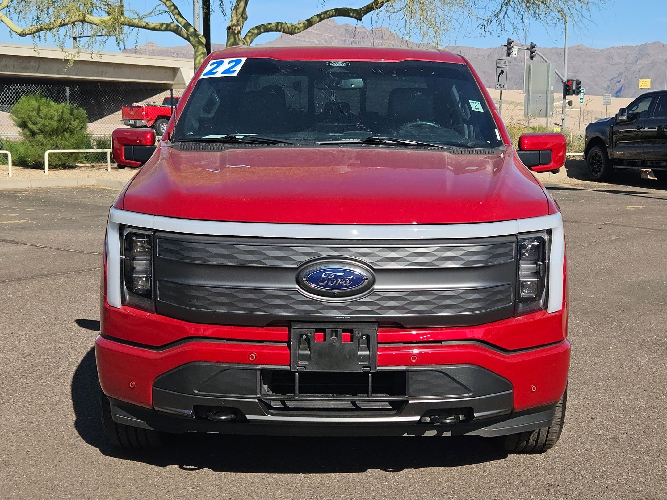 Used 2022 Ford F-150 Lightning Lariat with VIN 1FTVW1EV2NWG03504 for sale in Apache Junction, AZ
