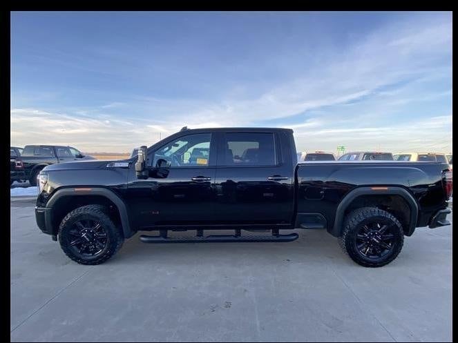 Used 2024 GMC Sierra 3500HD AT4 with VIN 1GT49VE76RF102763 for sale in Kansas City