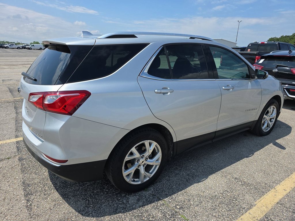 Used 2021 Chevrolet Equinox Premier with VIN 3GNAXNEV0MS166980 for sale in Kansas City