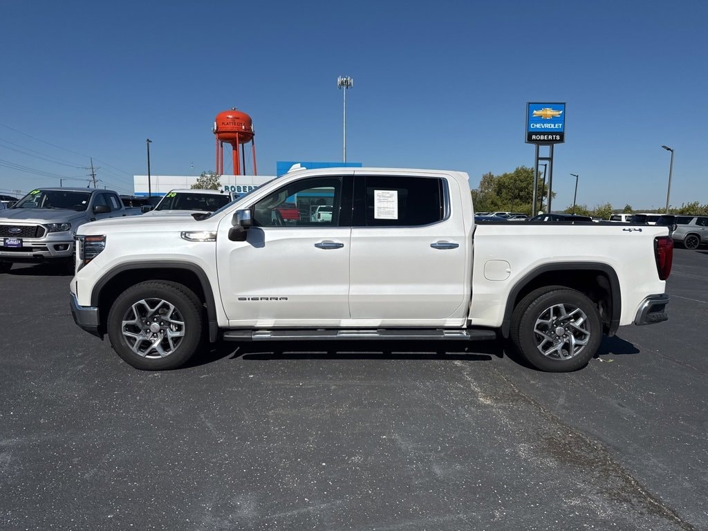 Used 2023 GMC Sierra 1500 SLT with VIN 1GTUUDE83PZ310841 for sale in Kansas City
