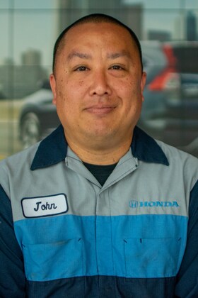 Staff member John Nguyen from 4b79f6c821ff