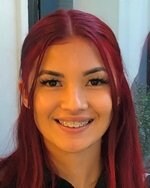 Staff member Caitlin Peredo from 2701b62185fe