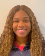 Staff member Sha Collins from 2701b62185fe