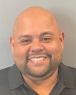 Staff member Adrian Almodovar from 9541500e9829