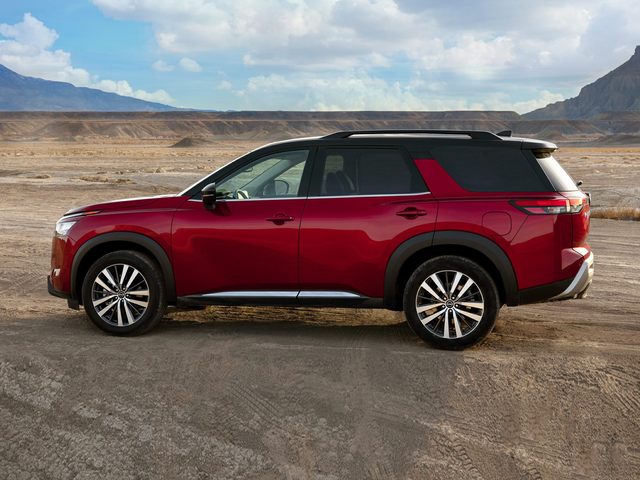 2022 Nissan Pathfinder SUV Platinum red on sandy expanse.jpg