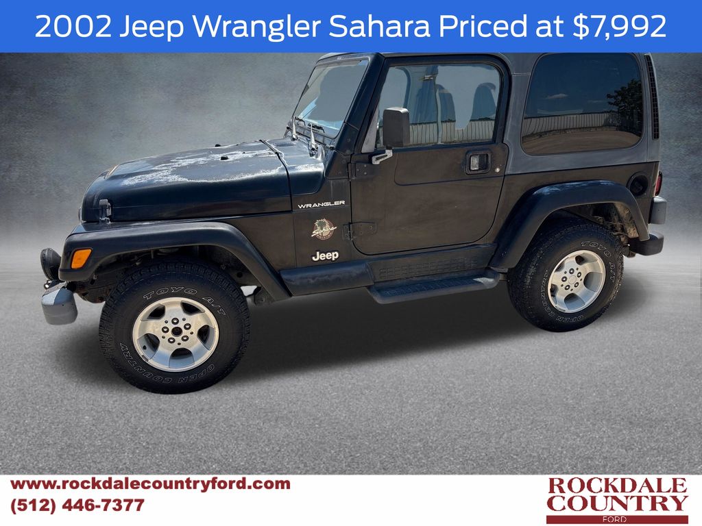 Used 2002 Jeep Wrangler SAHARA with VIN 1J4FA59S32P712659 for sale in Rockdale, TX