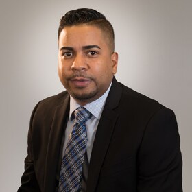 Staff member Joan Rivas from 25a607de5a43