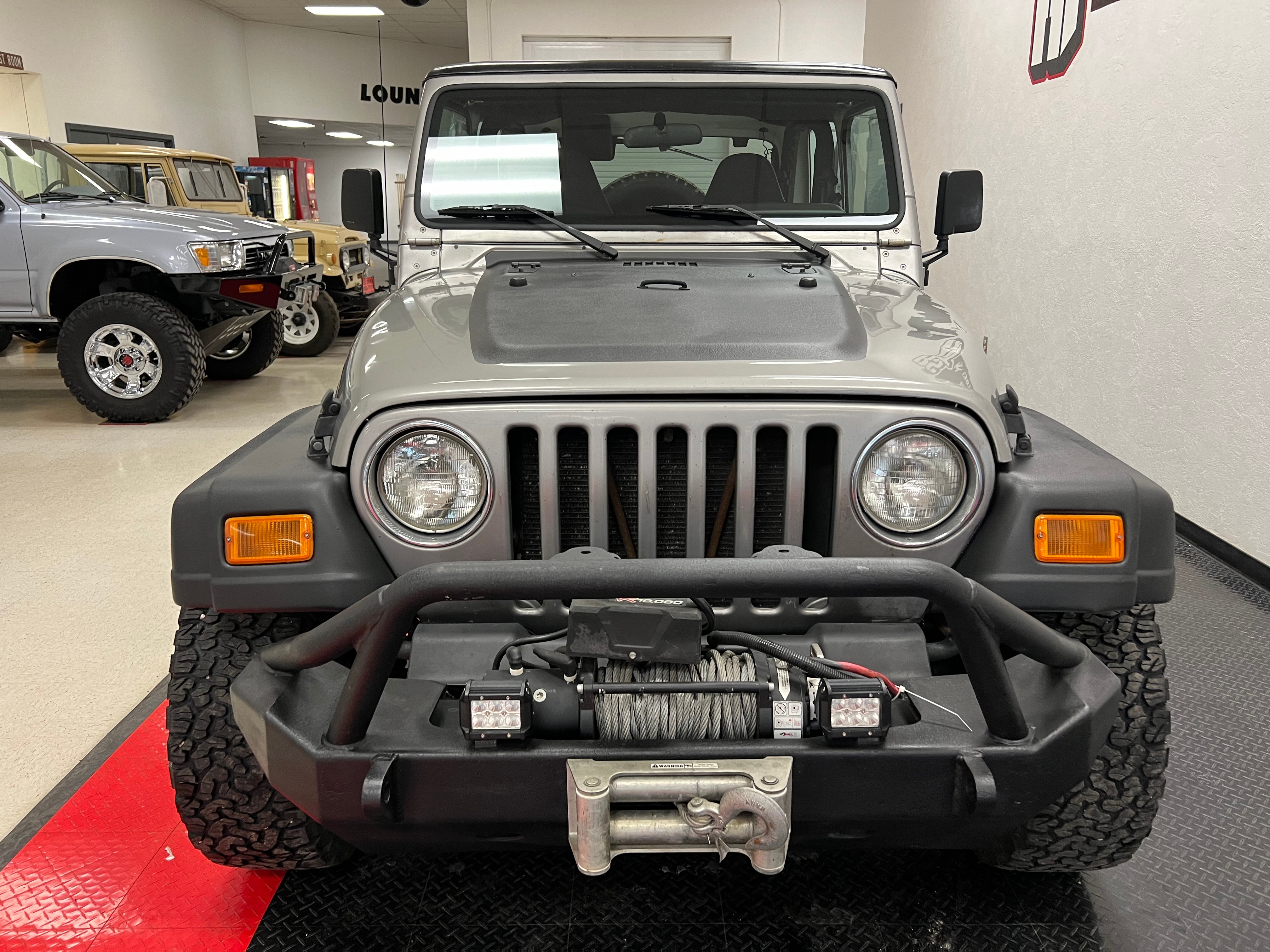 Used 2002 Jeep Wrangler SPORT with VIN 1J4FA49S72P707233 for sale in Rock Springs, WY