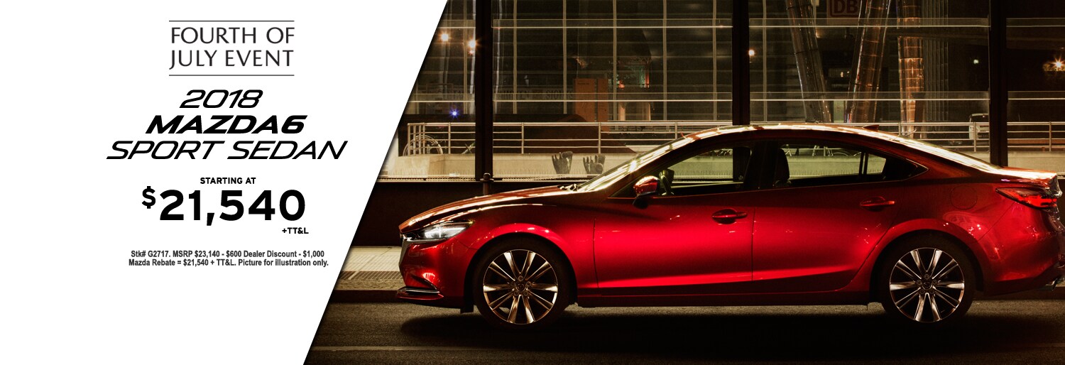 New Mazda & Used Car Dealership serving the area Roger