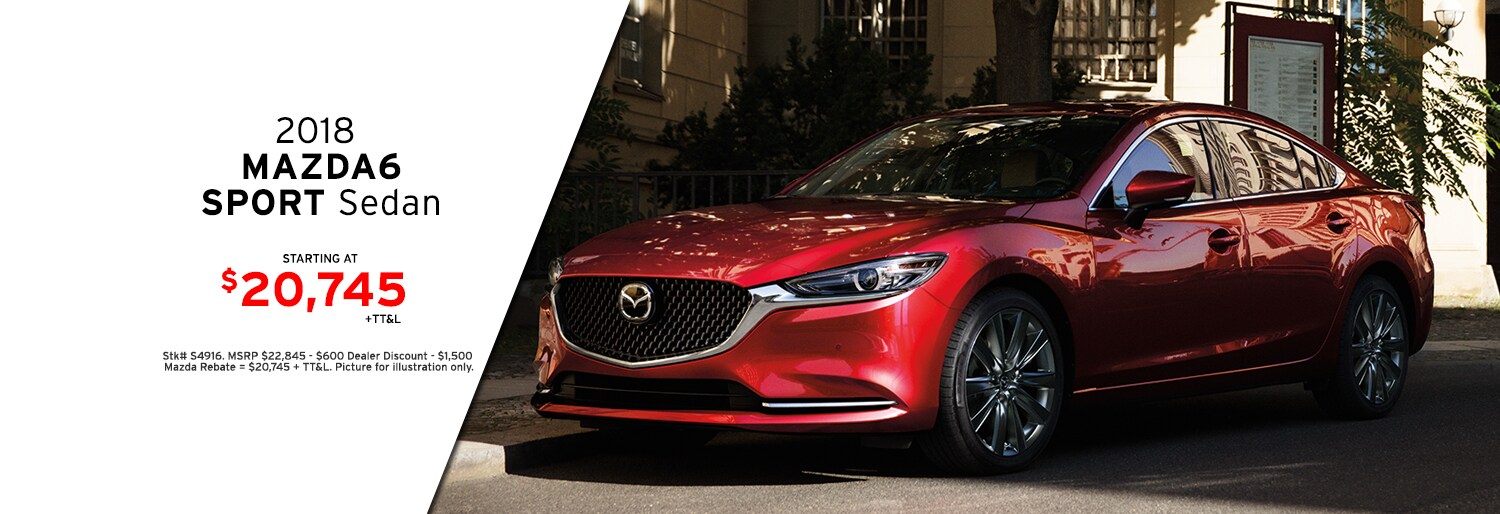 New Mazda & Used Car Dealership serving the area Roger