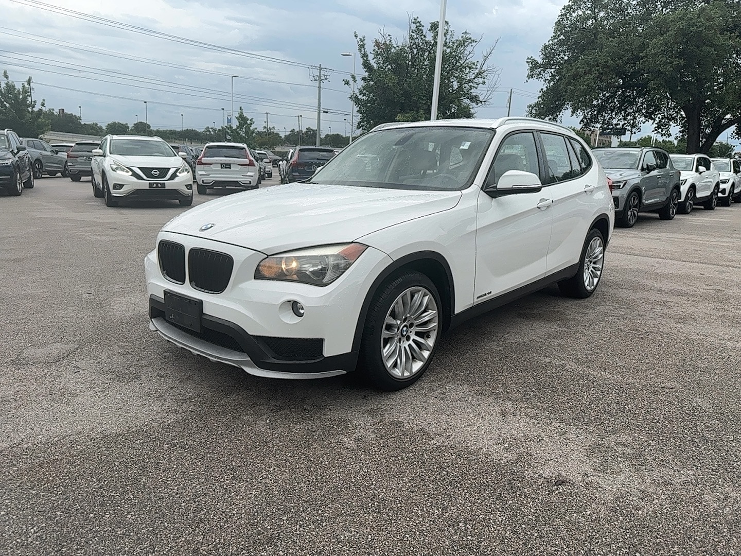 Used 2015 BMW X1 28i with VIN WBAVM1C57FV315149 for sale in Austin, TX