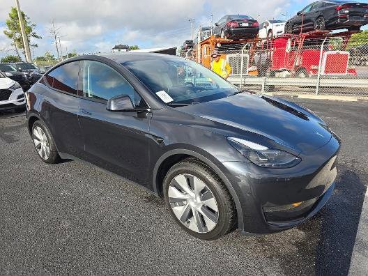 Used 2024 Tesla Model Y Long Range with VIN 7SAYGDED1RF038842 for sale in West Palm Beach, FL
