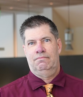 Staff member Mark Scott from ID_26211e