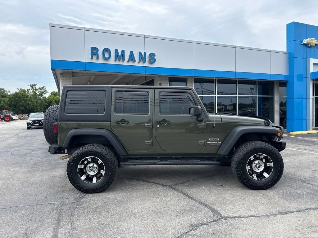 Used 2015 Jeep Wrangler Unlimited Sport with VIN 1C4BJWDG0FL610195 for sale in Independence, KS