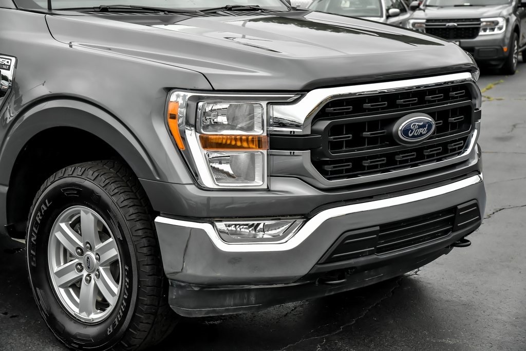 Used 2022 Ford F-150 XLT with VIN 1FTFX1E50NFA21578 for sale in Elgin, IL