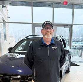 Staff member John De La Tour  from ID_fb01ddcbda1b