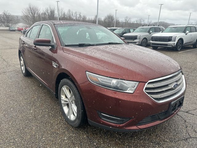 Used 2015 Ford Taurus SEL with VIN 1FAHP2E80FG206692 for sale in Akron, OH