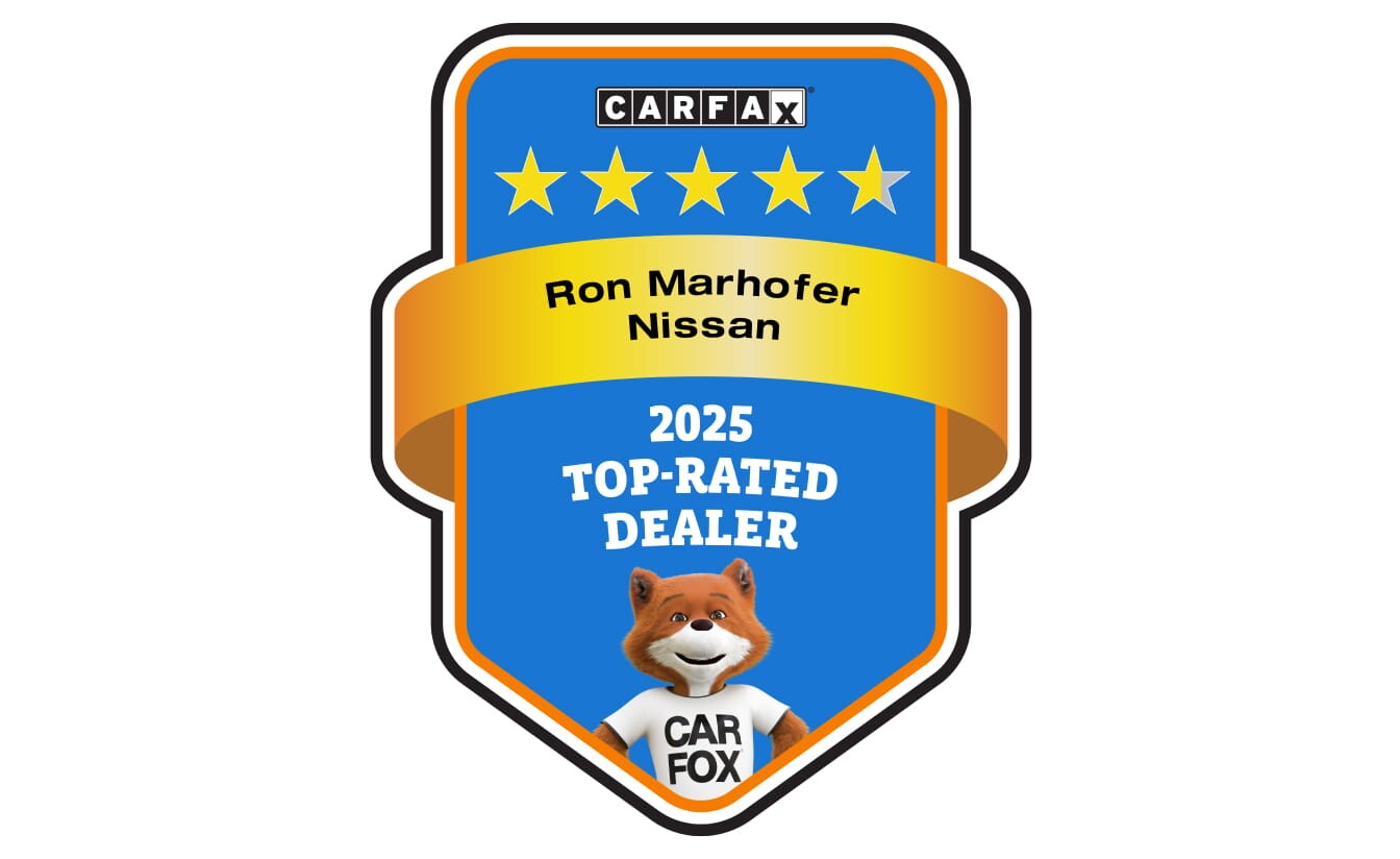 CARFAX 2025 Top-Rated Dealer award badge for Ron Marhofer Nissan featuring a five-star rating and CAR FOX mascot.