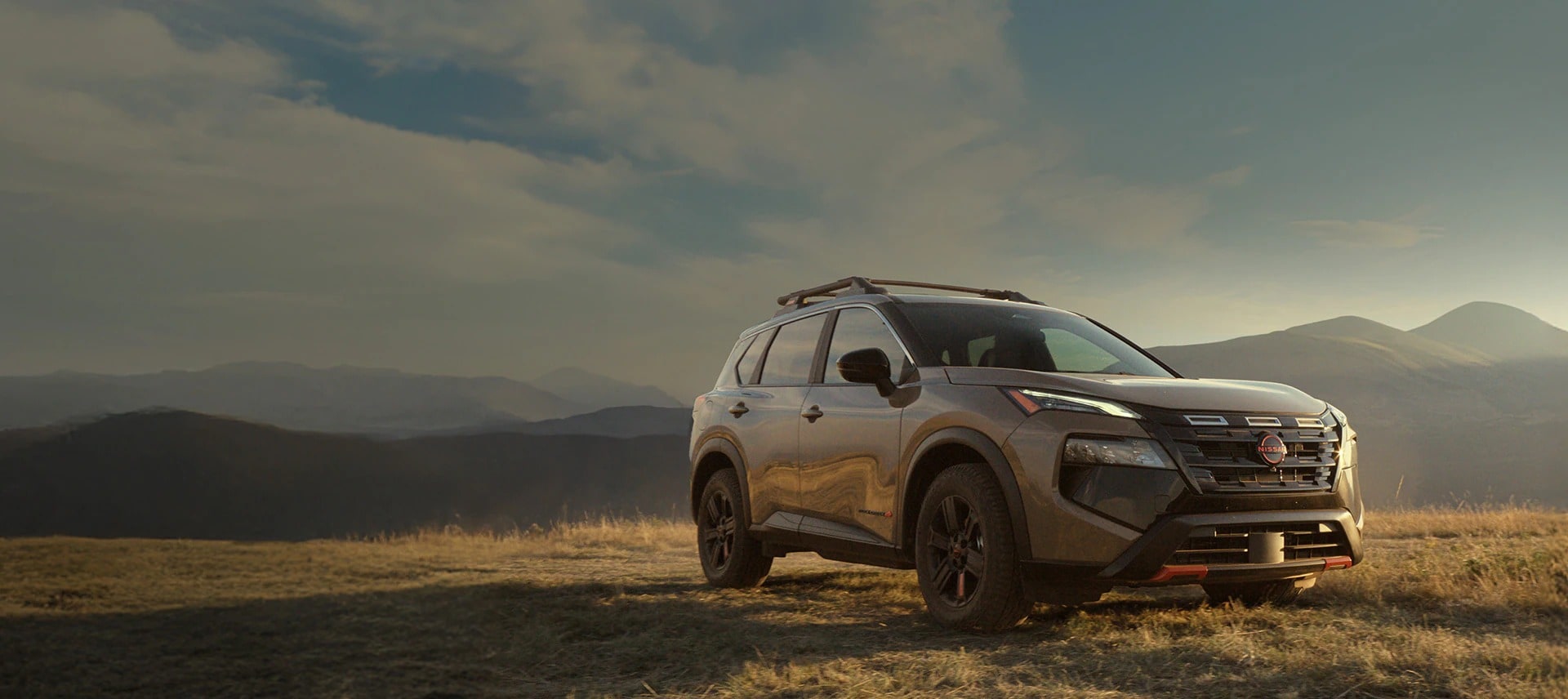 A dynamic image of the 2026 Nissan Rogue Rock Creek.