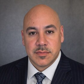 Staff member Jesse Sanchez from ID_811313