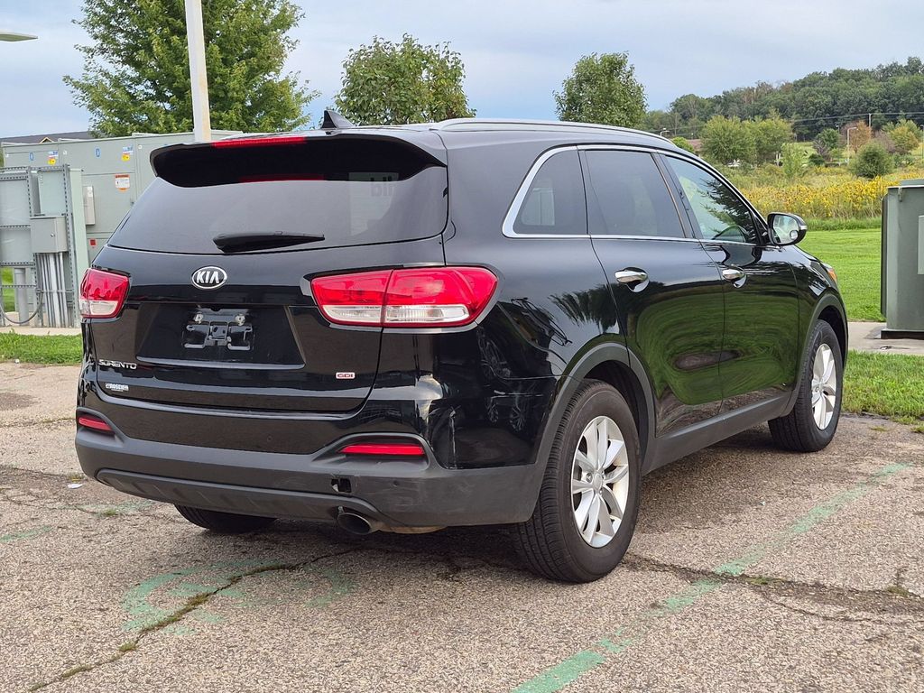 Used 2016 Kia Sorento LX with VIN 5XYPG4A32GG056617 for sale in Belleville, WI