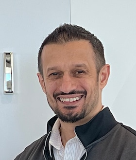 Staff member Adrian Salihu from ID_fd50d76d2c18