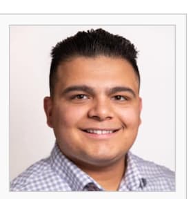Staff member Carlos Rosado from ID_d14b53642531